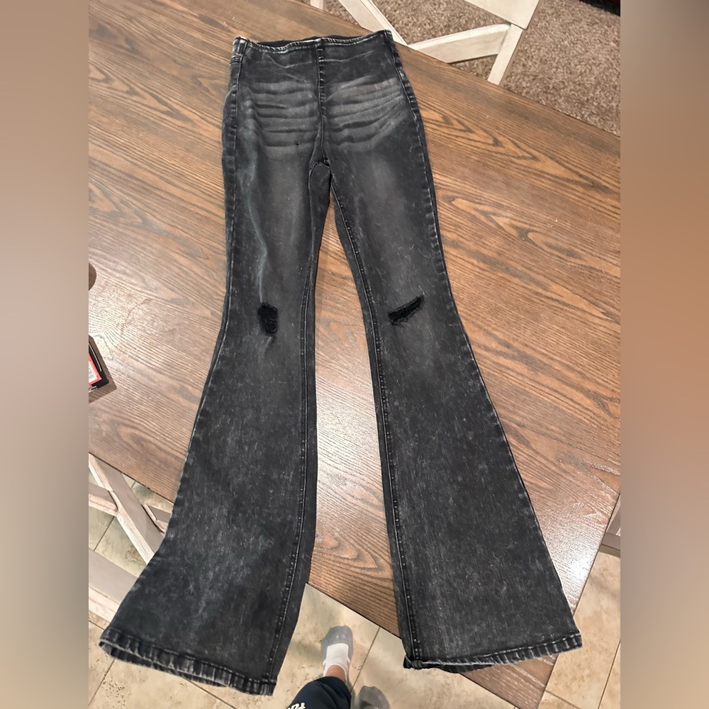 High-Rise Black Washed Flared Jeans with Knee Rips